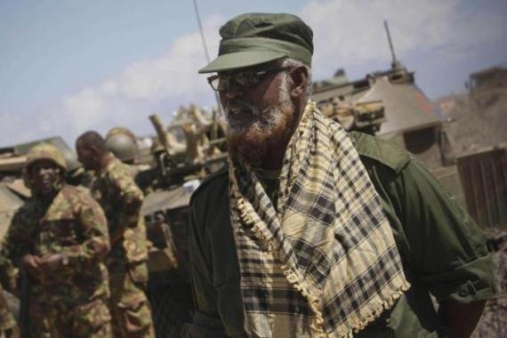 Handout photo shows Sheik Ahmed Madobe, commander of the Ras Kimboni Militia Brigade, which is allied to the Somali National Army looking on in Saa''moja, outside the Somali port city of Kismayu