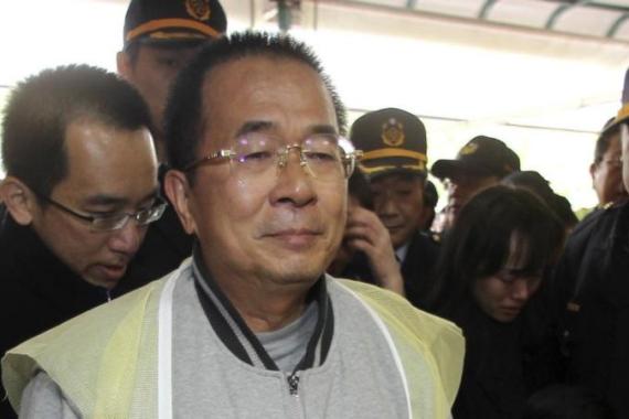 Taiwan''s jailed former President Chen Shui-bian mourns after crawling to the funeral house of his late mother-in-law, as part of Taiwanese custom, in Tainan