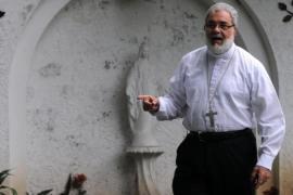 Bishop Romulo Emiliani gestures in San P