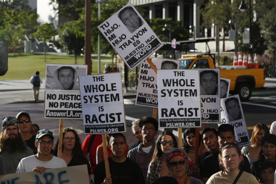 People gather during a rally to protest the acquittal of Zimmerman for the killing of Martin, in Los Angeles