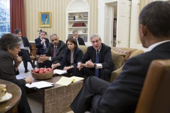 White House handout shows U.S. President Obama receiving an update from his national security team on Boston bombings.