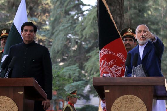 Pakistan''s Prime Minister Raja Pervez Ashraf (L) and Afghan President Hamid Karzai