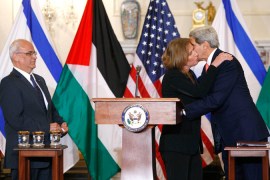 U.S. Secretary of State John Kerry and Israel''s Justice Minister Tzipi Livni embrace after a news conference with Chief Palestinian negotiator Saeb Erekat in Washington