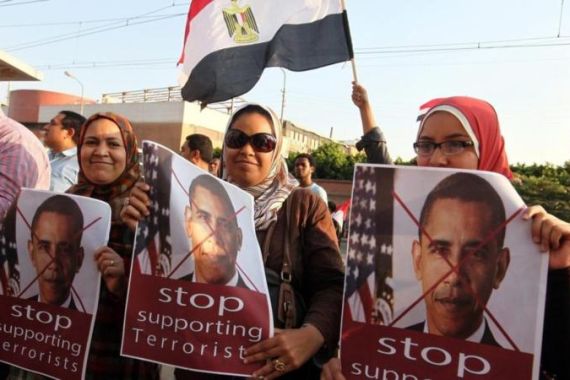 Egypt s opposing groups call for a mass rally to support new government