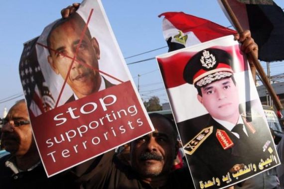Egypt s opposing groups call for a mass rally to support new government