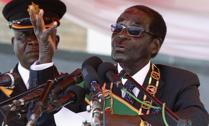 Zimbabwe''s President Mugabe addresses the crowd gathered to commemorate Heroes Day in Harare
