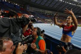 Isinbayeva of Russia celebrates after winning women''s pole vault final at World Athletics Championships in Moscow