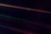 The Earth, photographed from nearly six billion kilometres away, appears as only a pale blue dot [NASA]
