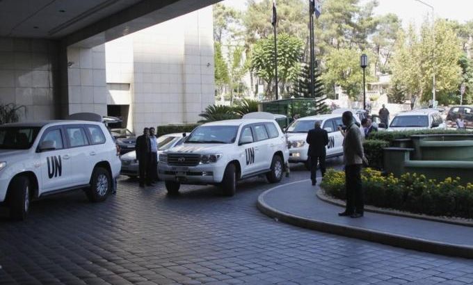 U.N. vehicles transporting a team of United Nations chemical weapons experts arrive in Damascus