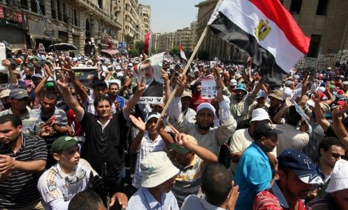 Supporters of the Muslim Brotherhood attend a protest in support of ousted Egyptian president Mohamed Morsi