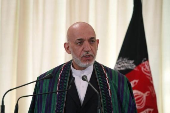 Afghan President Karzai speaks during a joint news conference in Islamabad