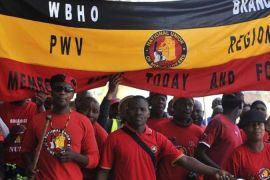 Members of the National Union of Mineworkers take part in a strike in Johannesburg