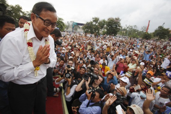 Rainsy greets supporters at Freedom Park in Phnom Penh