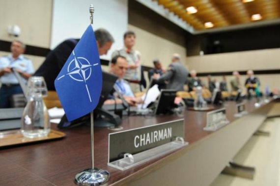 A picture of Nato flag before a Chiefs
