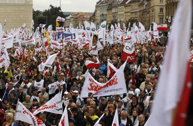 Protesters from several trade unions gather during an anti-government protest in Warsaw