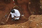 A new report suggests that the Sri Lankan army tried to cover up evidence of mass graves [AP]