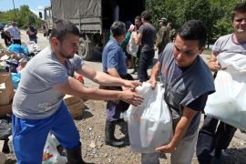 In Bosnia, thousands have volunteered time and resources to help those affected by the floods [EPA]