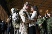 Canadian armed forces members were welcomed home, marking the end of Canada's participation in the Afghanistan war [AFP]