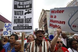 Residents have protested against water cut-offs in Detroit [Getty Images]