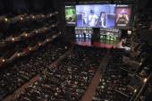 A packed Benaroya Hall watches as the two final Dota 2 teams compete for the first place. [Reuters]