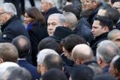 Netanyahu takes part with dozens of foreign leaders in a solidarity march in the streets of Paris [Reuters]