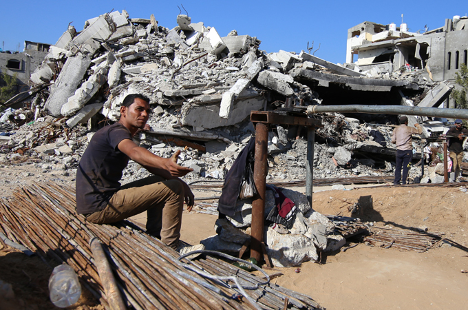 The damage in Shujayea is extensive and little has been repaired since the war [Hatem Omar/Al Jazeera]