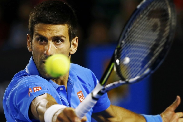 Djokovic of Serbia hits a return to Muller of Luxembourg during their men''s singles match at the Australian Open 2015 tennis tournament in Melbourne