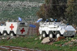 Spanish U.N. peacekeepers an armored vehicles, patrol the Lebanese Israeli border, in the southern village of Abbasiyeh, Lebanon, Wednesday, Jan. 28,