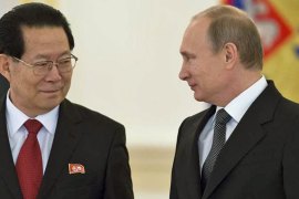 Russian President Vladimir Putin and new North Korea''s Ambassador Kim Hyun-joon attend a ceremony to hand over credentials at the Kremlin in Moscow