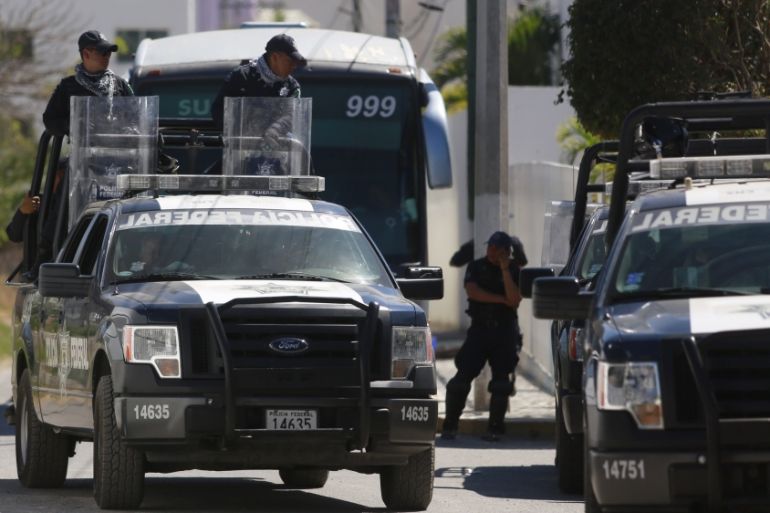 Federal police officers patrol on the streets near the attorney general''s office in Chilpancingo, in the Mexican state of Guerrero
