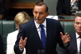 Australian PM Abbott speaks in the Australian Parliament in Canberra