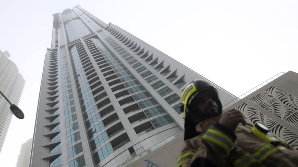 UAE's civil defence workers were praised for their response to the fire in the Torch, one of the tallest residential buildings in the world at 336.1 metres [EPA]