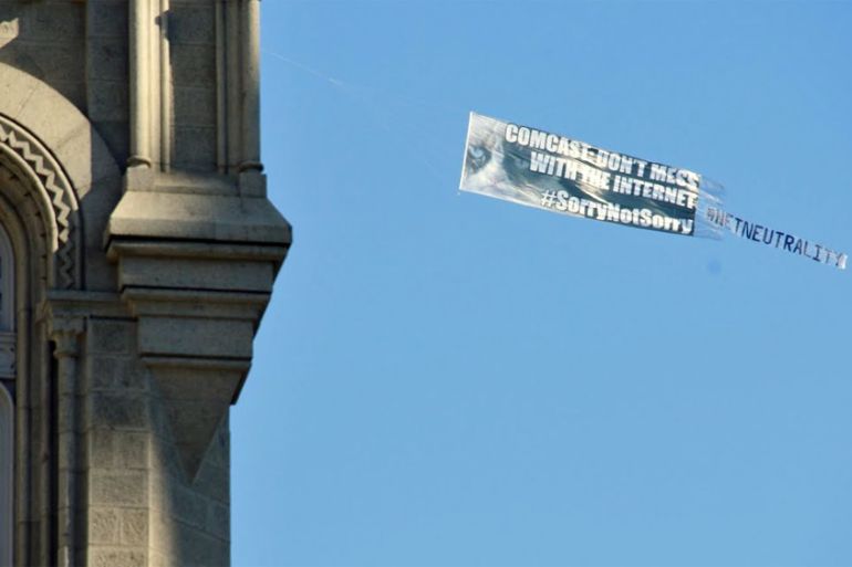 Banner over the corporate headquarters of Comcast