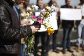 Palestinians gather to remember the Chapel Hill shooting victims, the three young Muslims who were gunned down in North Carolina this week, in Gaza City