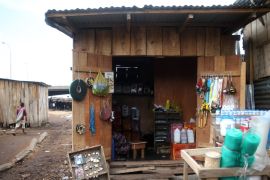 A shop built from planks, where carpentry hardware is sold, is seen at Okobaba sawmill at the edge of the Lagos Lagoon