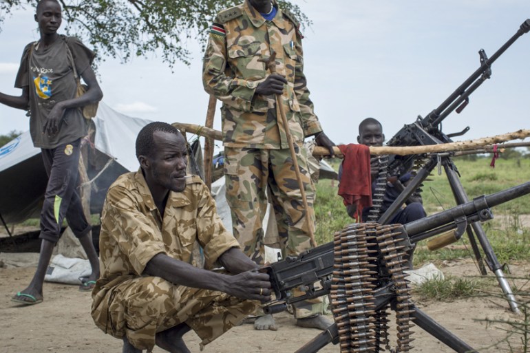 South Sudan rebels guard the village of Majieng, about 6km from the town of Bentiu