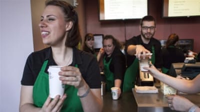 Some 40 percent of Starbucks' baristas are members of a racial minority [REUTERS]