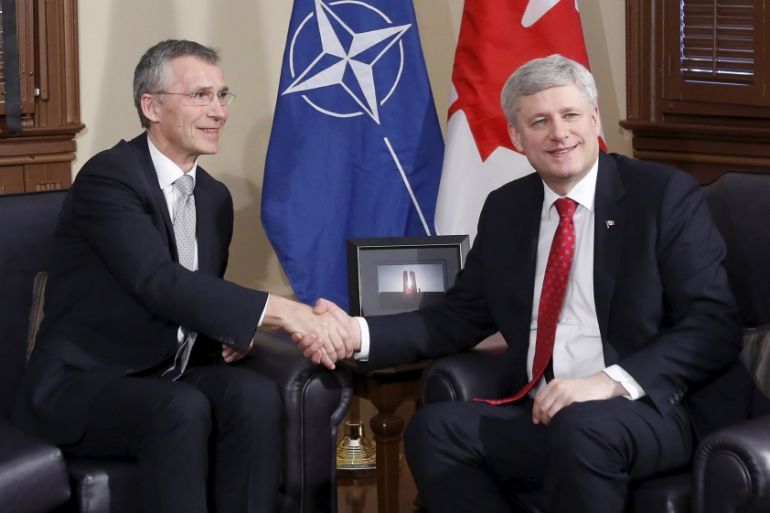 Canada''s PM Harper shakes hands with NATO Secretary General Stoltenberg in Ottawa