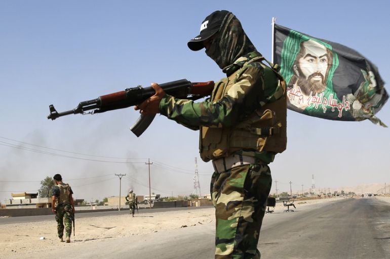 Iraqi fighter from the Shi''ite Badr Brigade militia