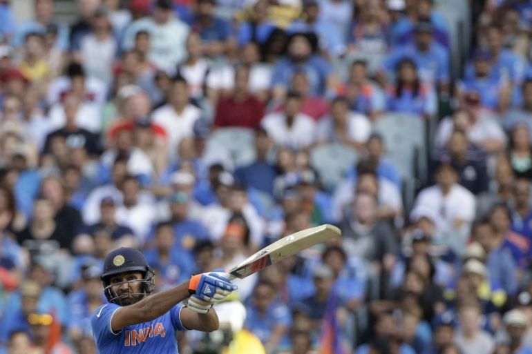 India''s batsman Rohit Sharma hits the ball for six runs during his Cricket World Cup quarter final match against Bangladesh in Melbourne