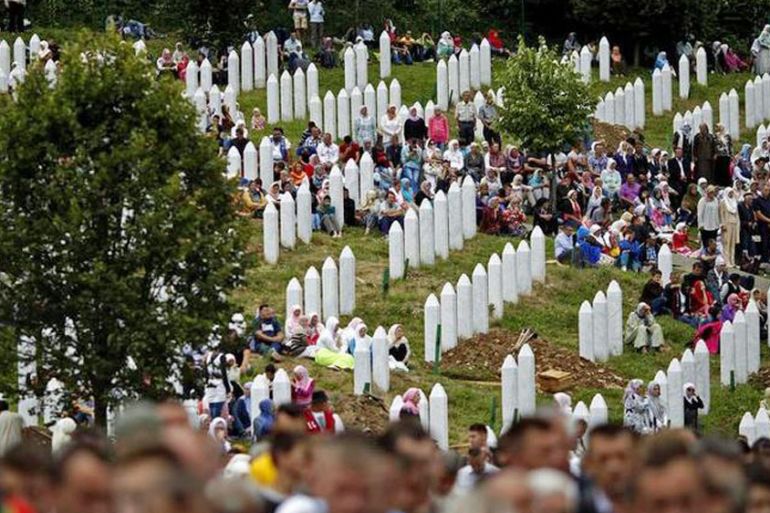 Bosnian Muslims attend the mass funeral of 175 newly identified victims from the 1995 Srebrenica massacre, in Potocari Memorial Center, near Srebrenica