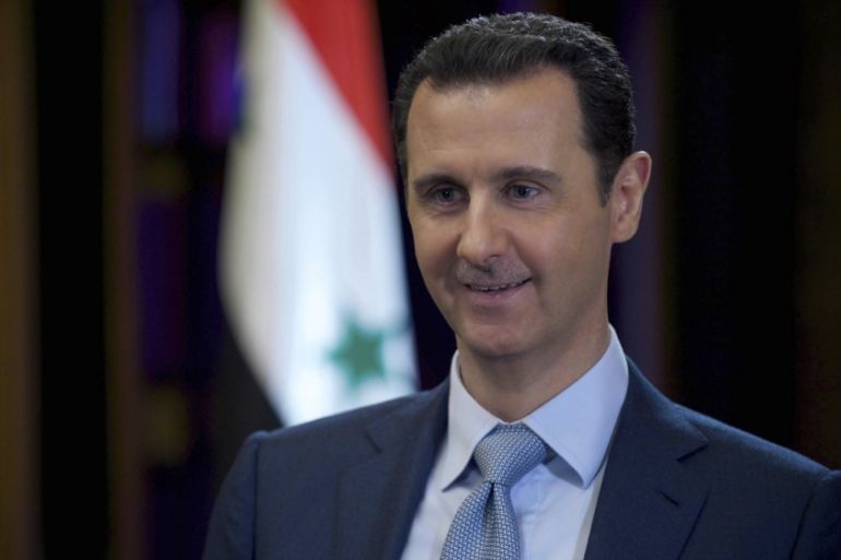 Syria''s President Bashar al-Assad is seen during the filming of an interview with the BBC, in Damascus