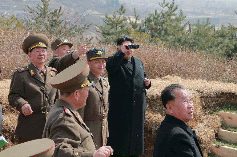 North Korean leader Kim Jong Un watches over military air force exercises