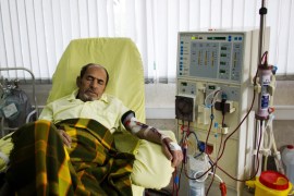 An Iranian kidney patient receives treatment at the dialysis ward at the Helal Iran Clinic in Tehran [AFP]