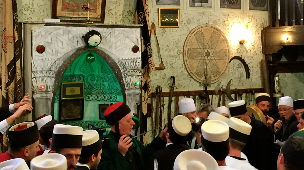 Members of the Sufi sect pierce each other, sing, and dance [Valerie Hopkins/Al Jazeera]