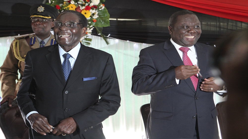 When the opposition gained strength in elections, Mugabe used violence and threats to reach a power-sharing agreement with opposition leader Tsvangirai of the MDC [The Associated Press]