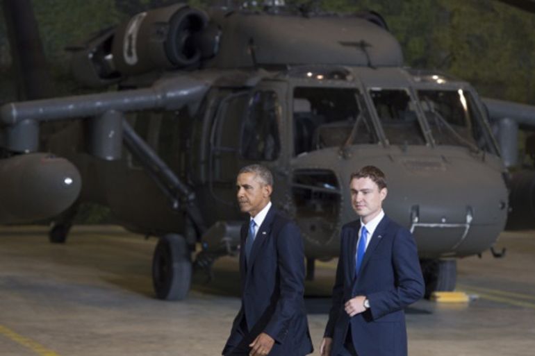 US President Barack Obama and Prime Minister Taavi Roivas of Estonia leave after speaking to US and Estonian members of the military at a hangar at Tallinn Airport in Tallinn, Estonia, September 3