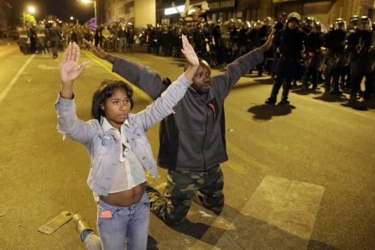Protesters demonstrate in Baltimore [AP]