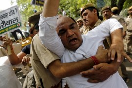 Activist from the youth wing of India''s opposition Congress party scuffles with police