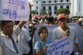 Myanmar activists march to commemorate the anniversary of a crackdown on protesters occupying Letpadaung copper mine [AP]